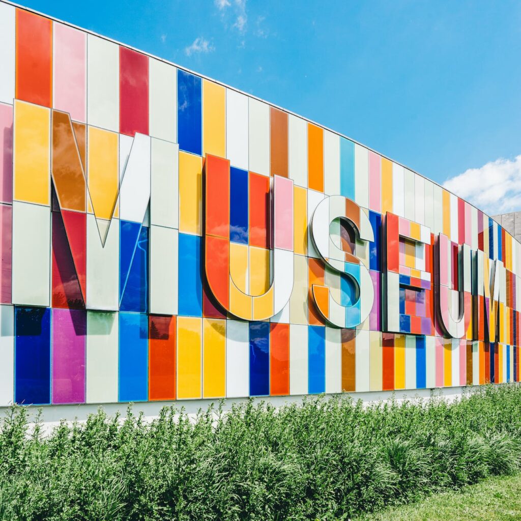 multicolored museum sign